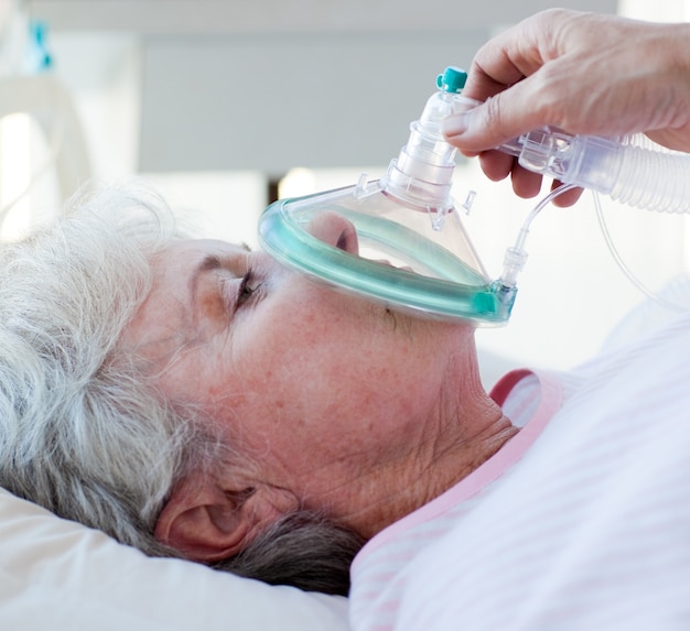 Premium Photo | Close-up of a female patient receiving oxygen mask