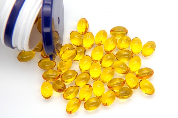 Close Up Fish Oil Capsules On White Background Many Gel