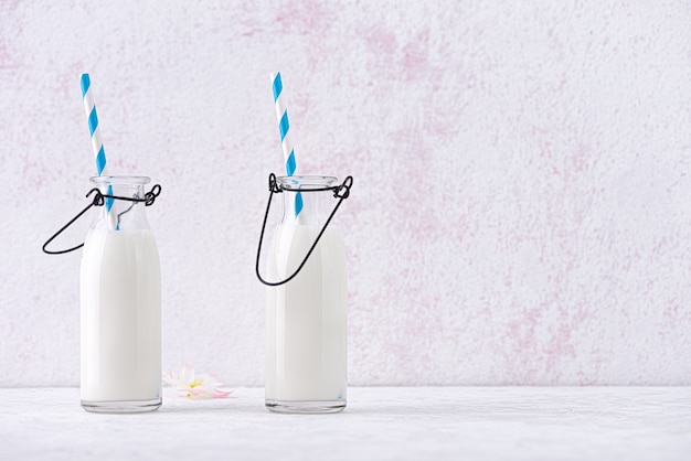 Premium Photo Close Up Of Fresh Milk In Glass Bottles