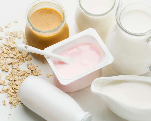 Close-up fresh yogurt with organic milk Free Photo