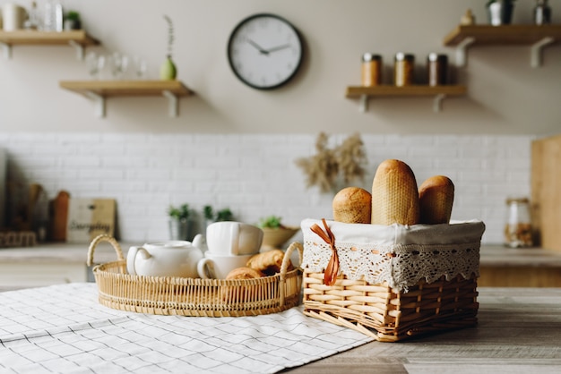 kitchen table covered with bread and milk