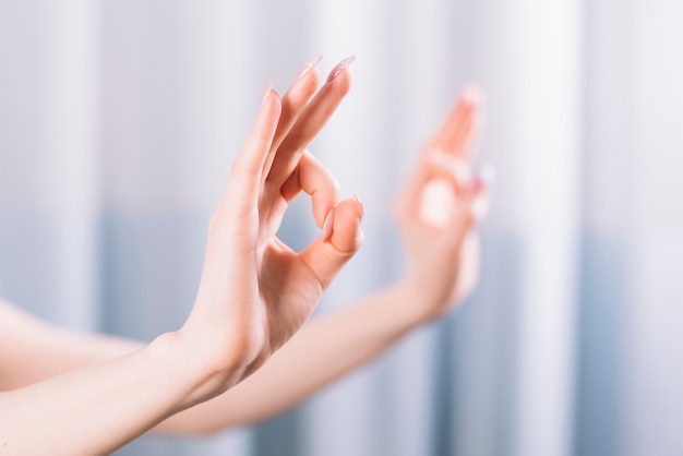 Free Photo Close Up Of Hand Showing Gyan Mudra Gesture