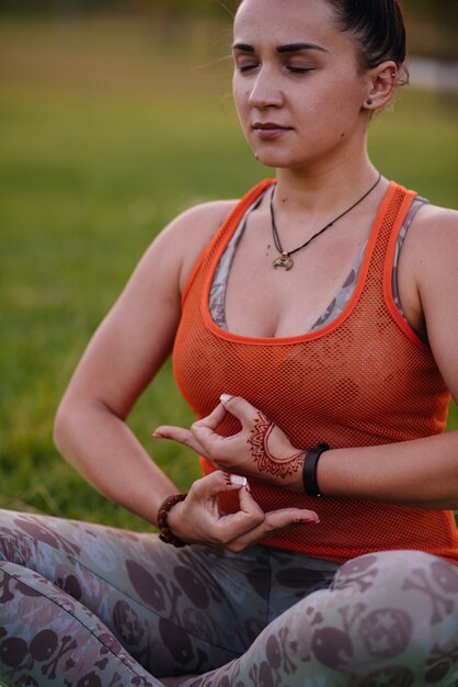 Premium Photo | Close-up of the hands of a young girl who does yoga ...