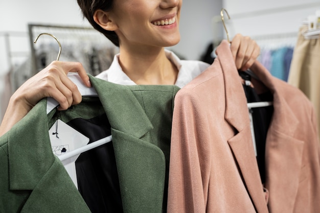 Close Up Of Happy Woman Holding Hanger With Shirt Stock Photo   Image