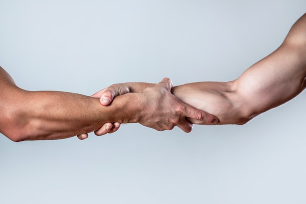 Premium Photo Close Up Help Hand Two Hands Helping Arm Of A Friend Teamwork Helping Hand Concept And International Day Of Peace Support Closeup Helping Hand Outstretched Isolated Arm Salvation