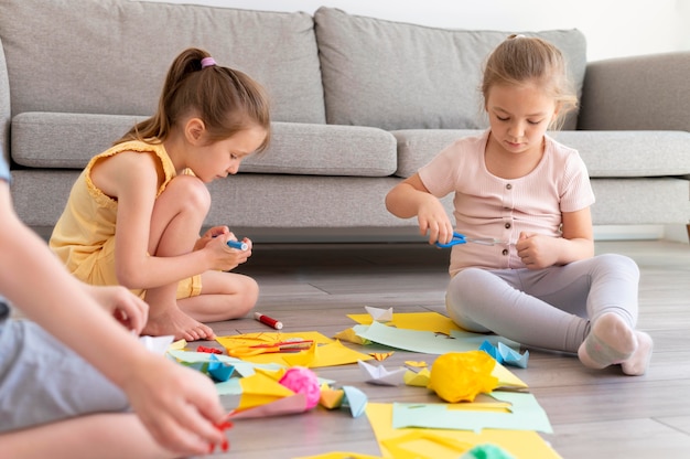 Free Photo | Close up kids playing on floor