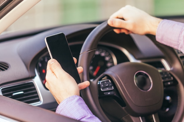 Premium Photo | Close-up of a male hand in a modern car