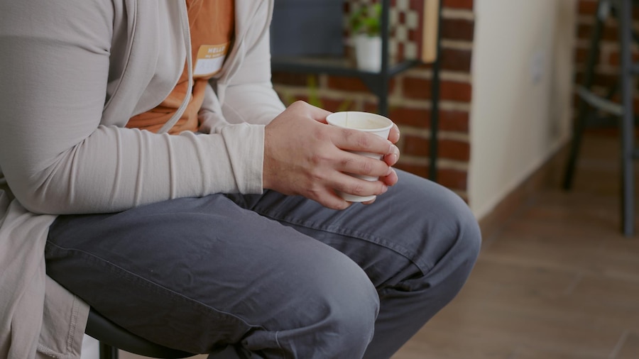 free-photo-close-up-of-man-trembling-and-holding-cup-of-coffee-at-aa