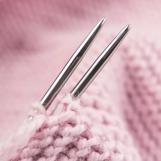 Premium Photo Closeup of metal crocheting needles