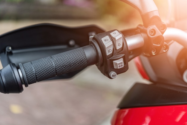 Premium Photo | Close up motorcycle horn button and handlebar