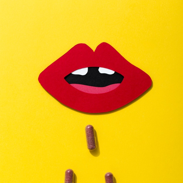 Free Photo | Close-up of mouth with pills