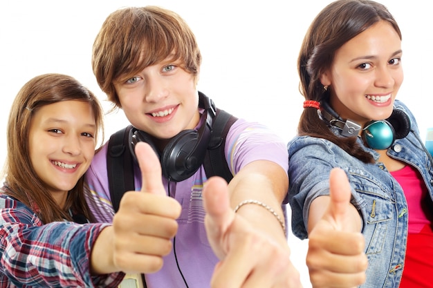 Close-Up Of Teenagers Showing Thumbs Up Photo  Free Download-8942