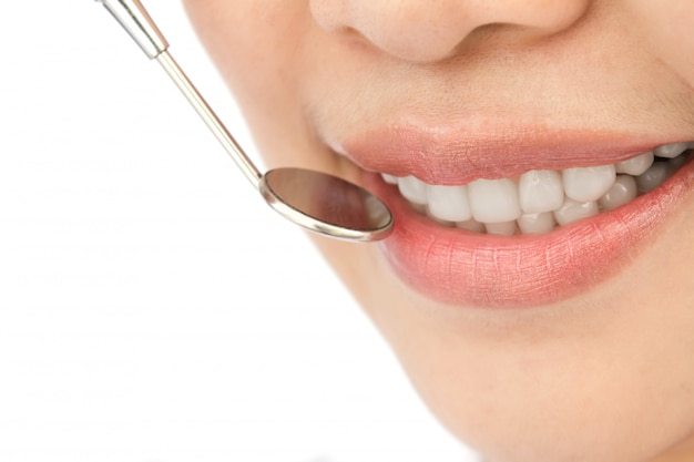 Close-up of woman in a dental checkup Free Photo