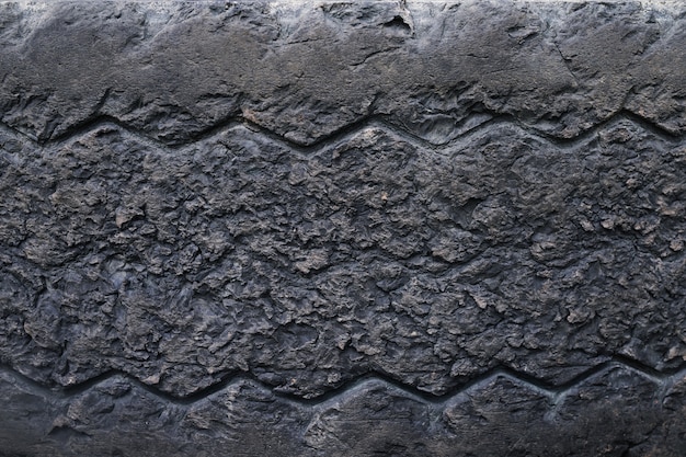 Premium Photo | Close up old damaged and worn black tire tread truck ...