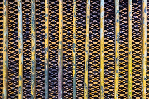 Close up old grunge rusty backhoe tractor radiator protector texture background Premium Photo