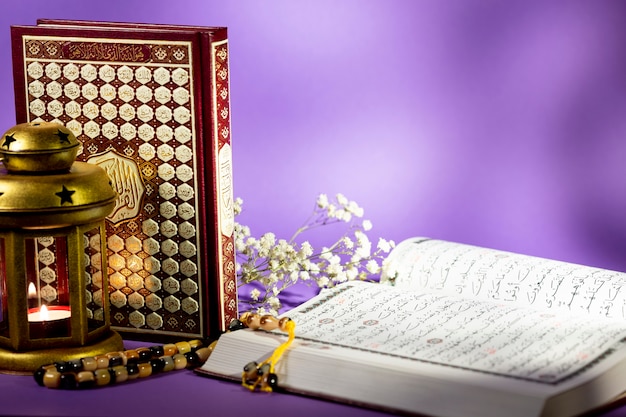 Close up open quran with purple background Photo | Free ...