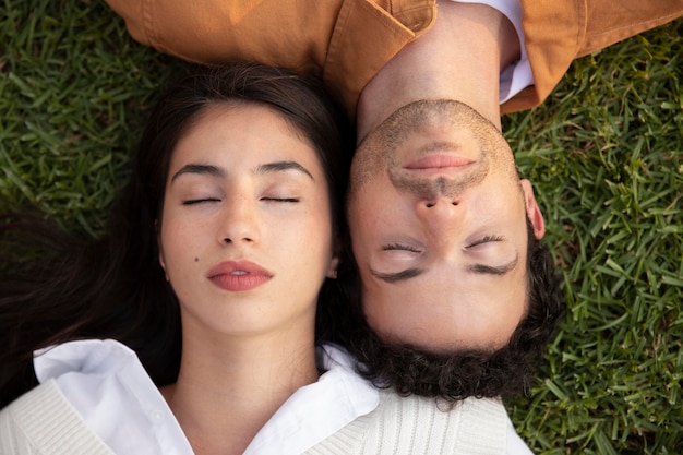 Premium Photo Close Up People Sleeping On Grass