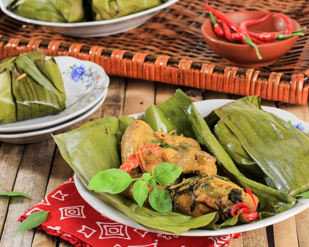 Premium Photo | Close up pepes ayam pais hayam is indonesian steamed ...