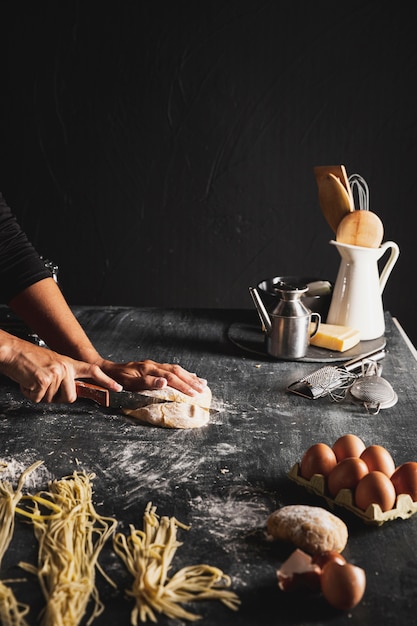 Free Photo Close Up Person Cutting Dough With Utensils