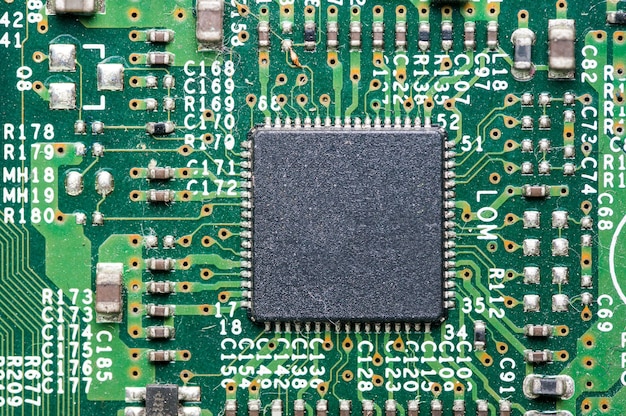 Premium Photo | Close-up photo of green computer circuit board and ...