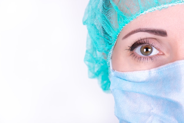 Premium Photo | Close up portrait of adult female surgeon doctor ...