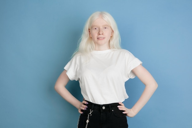 Free Photo Close Up Portrait Of Beautiful Caucasian Albino Girl On Blue Blonde Female Model With Stylish Look Concept Of Facial Expression Human Emotions Childhood Ad Sales Diversity