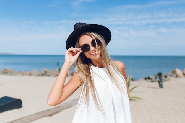 Free Photo Closeup Portrait Of Pretty Blond Girl With Long Hair Is