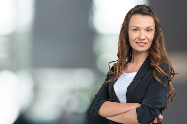 Close up portrait of a professional business woman smiling Premium Photo
