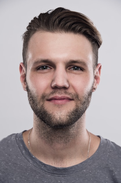 Premium Photo | Close up portrait of serious gloomy bearded man with ...