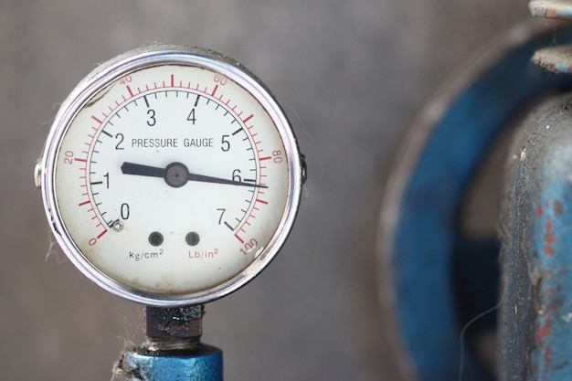 Premium Photo | Close up pressure gauge with compressor.