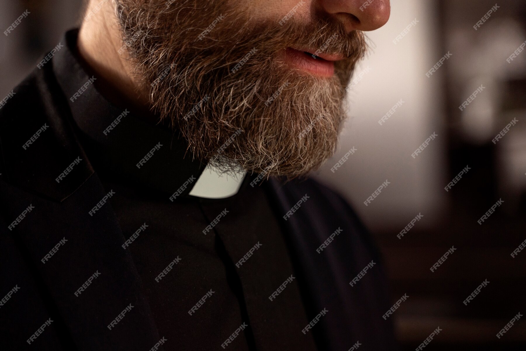 Free Photo | Close up on priest praying