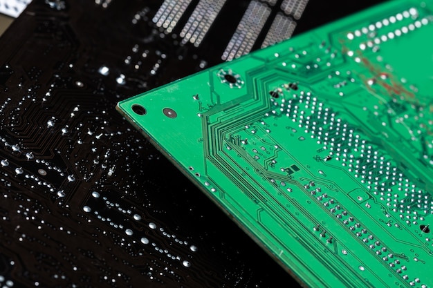 Close up of a printed green computer circuit board Premium Photo