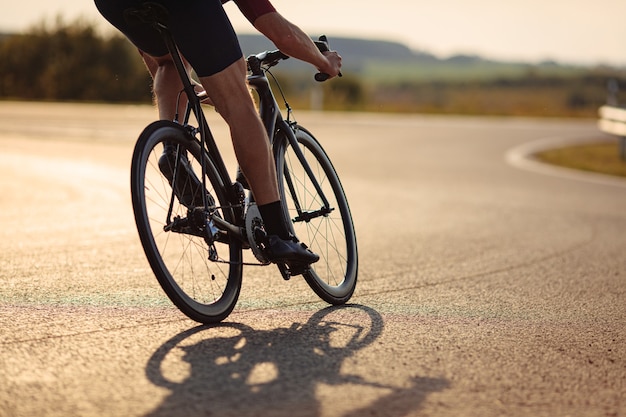 Premium Photo | Close up of professional road cyclist with strong legs ...