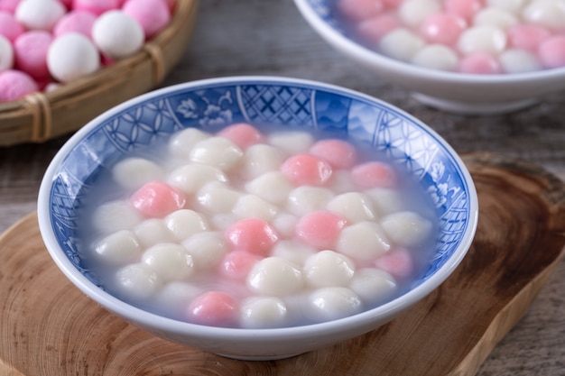 Premium Photo | Close up of red and white tangyuan (tang yuan ...