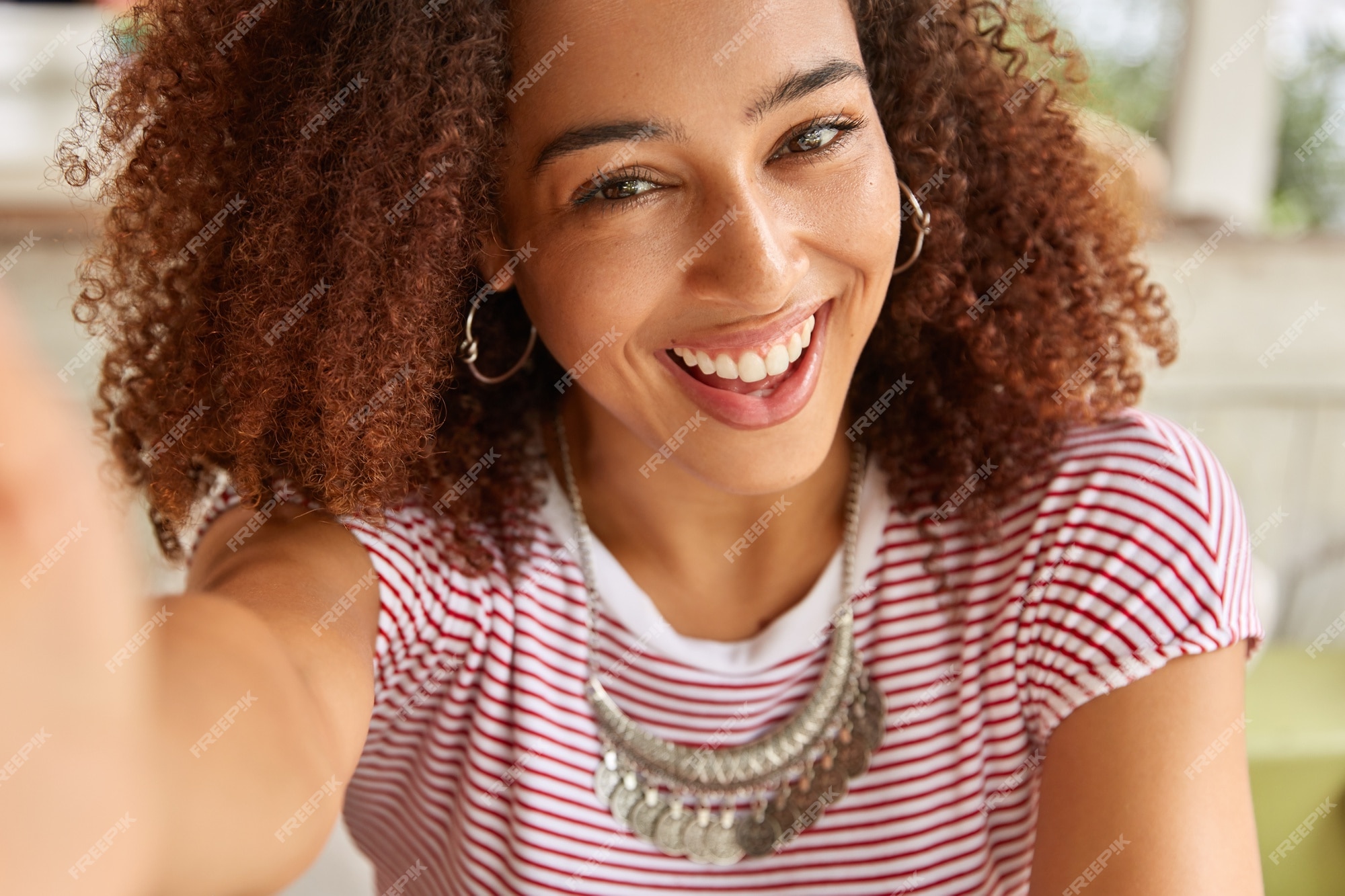 free-photo-close-up-shot-of-attractive-dark-skinned-girl-looks-joyfully