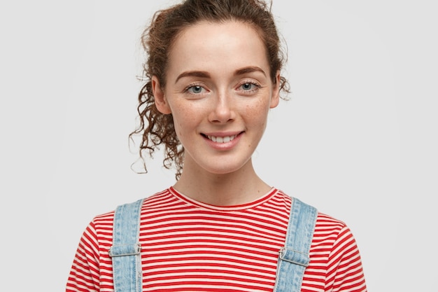 Free Photo Close Up Shot Of Attractive Freckled Woman With Curly Hair