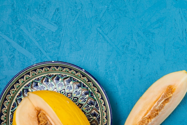 Free Photo | Close-up shot of watermelon in plate on blue background