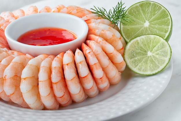 Premium Photo Close Up On Shrimp Ring With Sweet Chili Sause With Dill And Lime