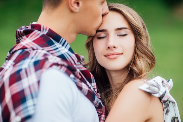 Premium Photo | Close up side view portrait of amazing couple embracing ...