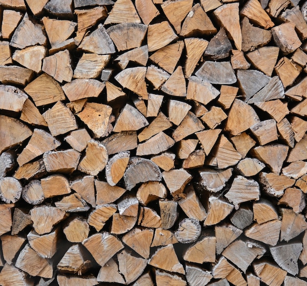 Premium Photo Close Up Stack Of Dry Firewood Oak Wooden Logs Chopped Split And Organized In