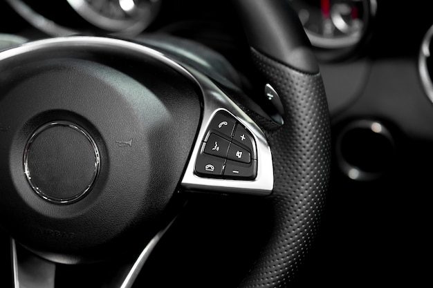 Close Up Of Steering Wheel Commands In Modern Luxury Car