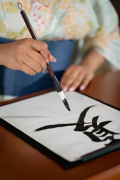 free-photo-close-up-on-teacher-doing-japanese-calligraphy-called-shodo