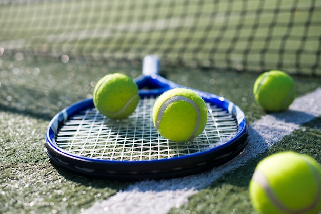 Free Photo | Close-up tennis racket and balls