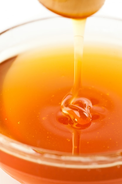 Premium Photo Close Up Of A Thin Honey Trickle