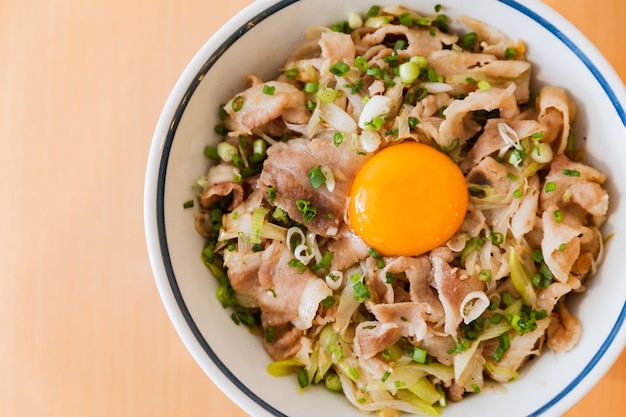 Premium Photo | Close up top view of butadon: japanese rice bowl dish