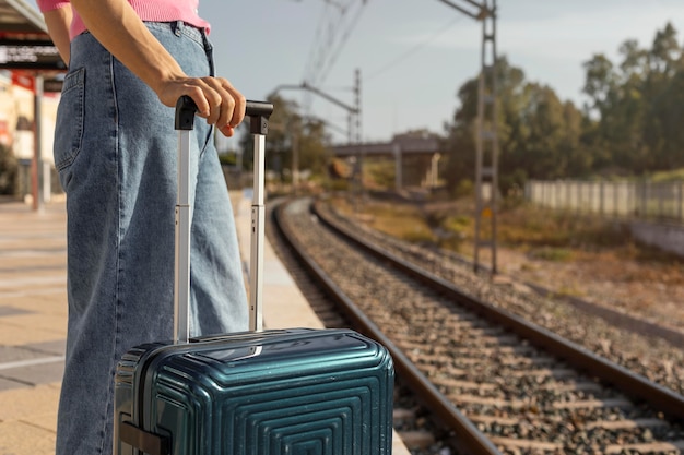 Premium Photo | Close up traveler holding luggage