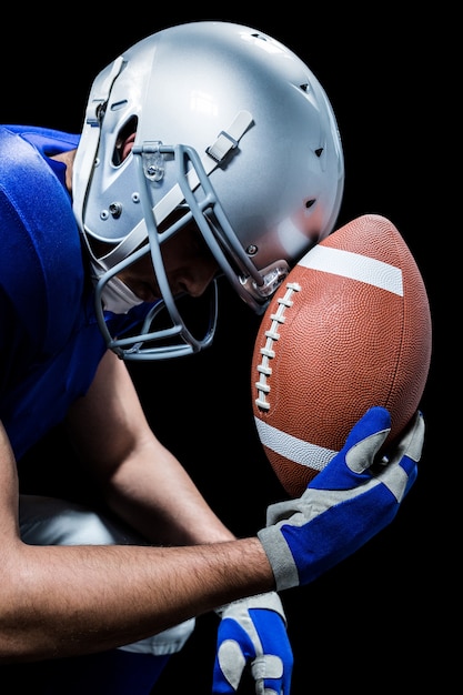 Premium Photo Close Up Of Upset American Football Player With Ball