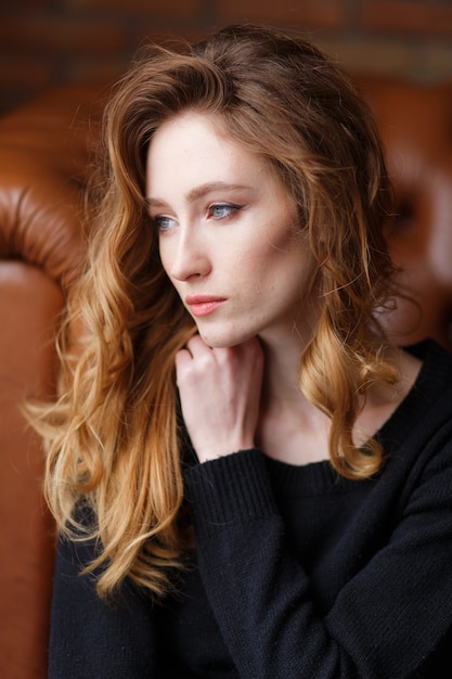 close up vertical portrait of young beautiful red haired woman. Free Photo