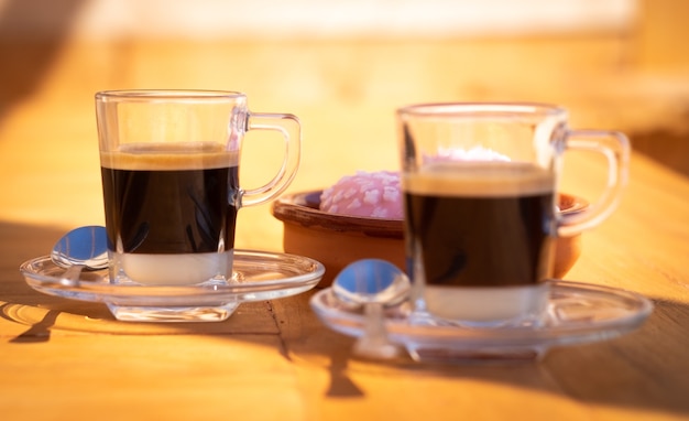 Premium Photo Close Up View Of A Couple Of Traditional Spanish Coffee Made With Condensed Milk And Espresso Coffee Focus On The Most Distant Cup