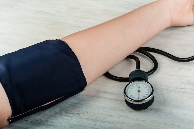 Close up view of person measuring his blood pressure Premium Photo